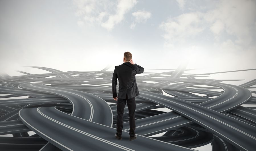 man-facing-many-difficult-choices-cross-roads